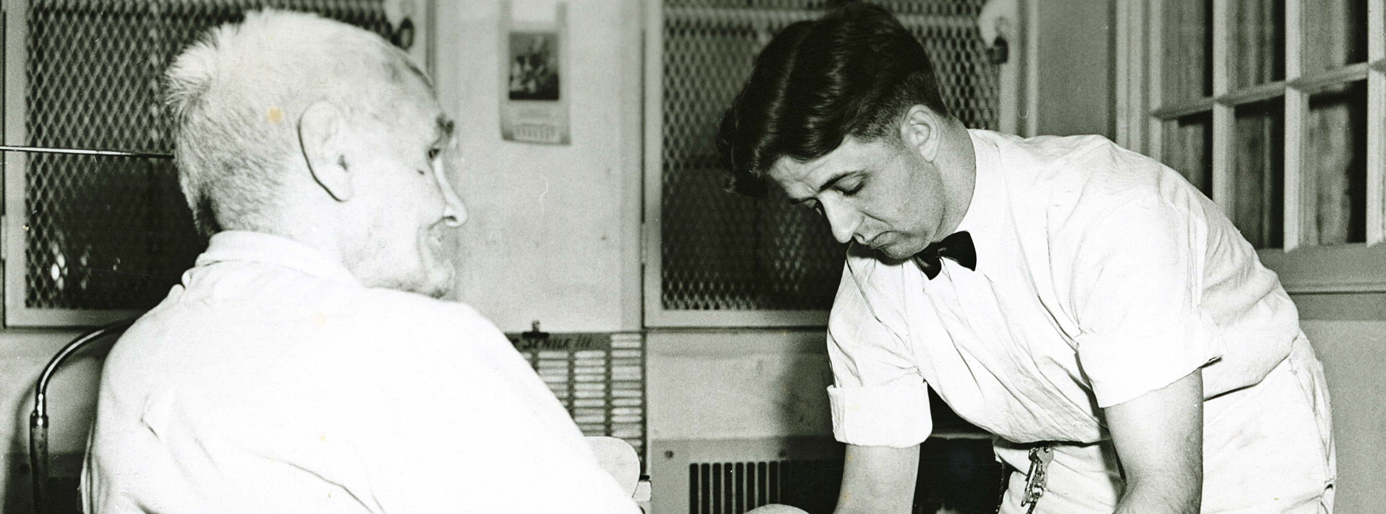 A conscientious objector, unidentified, cares for a patient at New Jersey State Hospital in Marlboro, New Jersey in 1943–1946. 